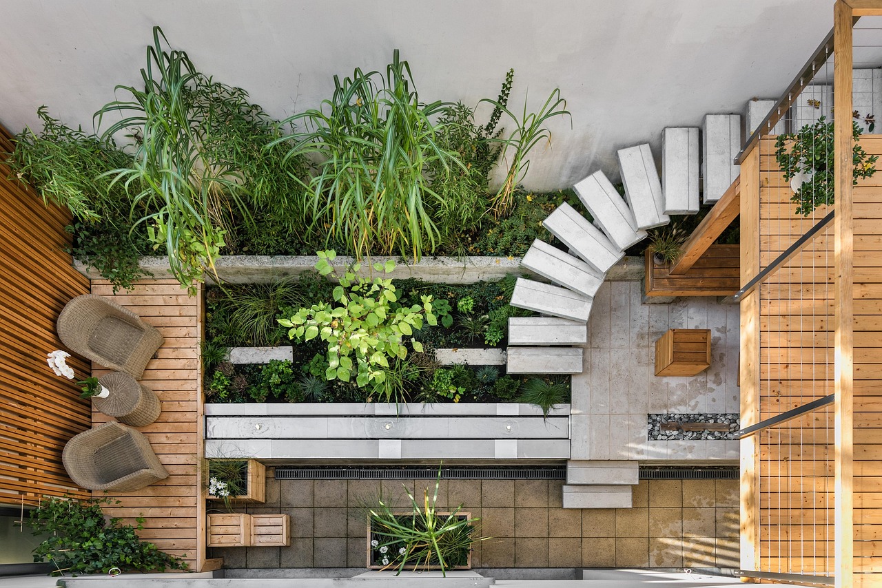 Minimalistisch loungemeubel in elegant tuinontwerp.